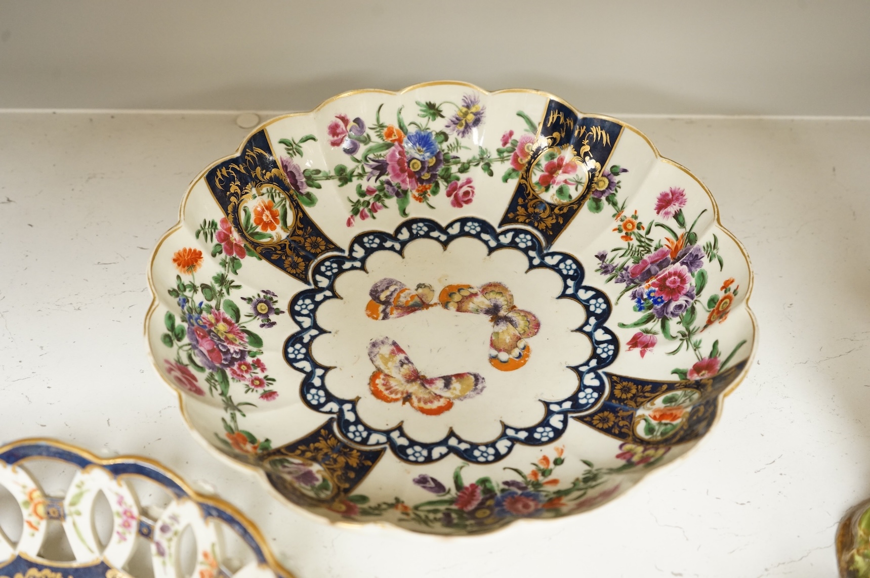 A Worcester scale blue two handled basket, c.1775, 28cm wide, and a similar bowl